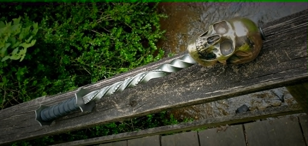 Chiseled Bronze Skull Mace